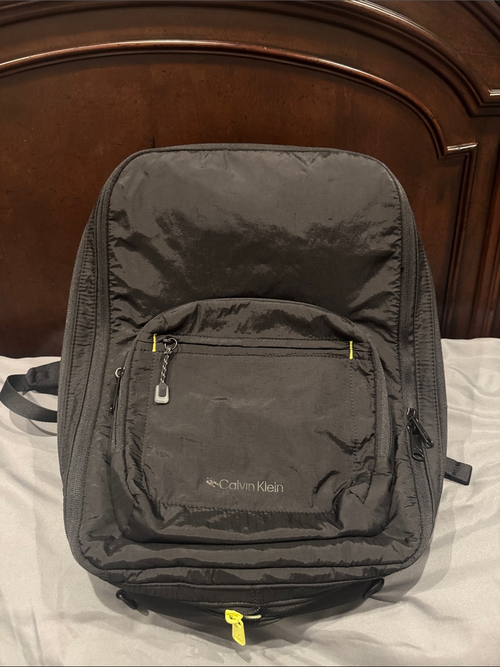 Calvin Klein Men's Black Backpack with Subtle Yellow Accents